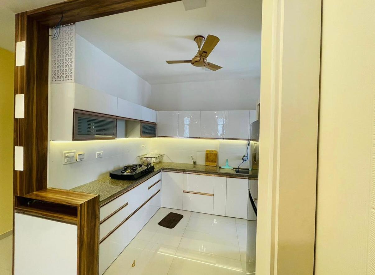 White L shape modular kitchen in Wagholi Pune
